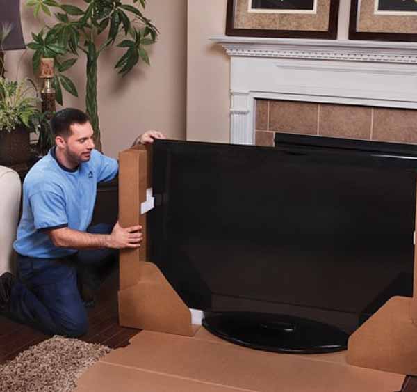 Two Men moving furniture